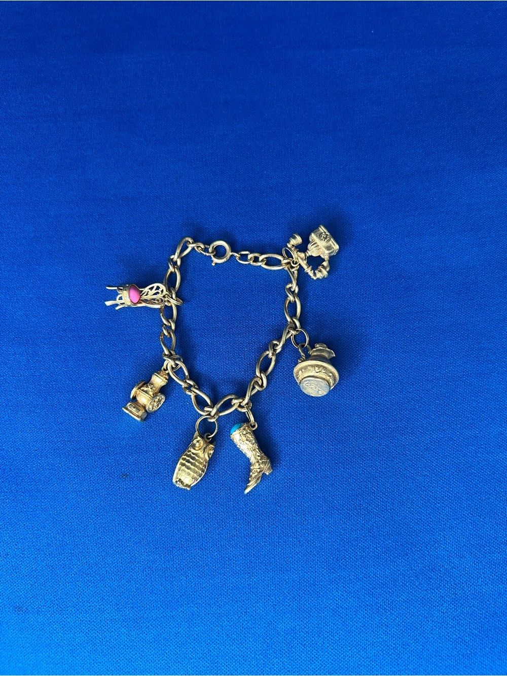 Vintage Avon Gold-Tone Charm Bracelet with 6 charms